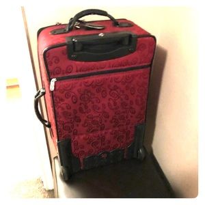 Brighton Suitcase 22” on rollers.